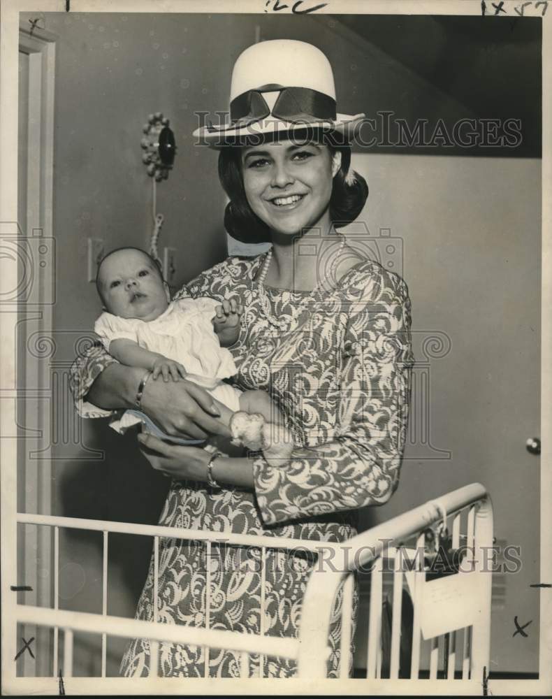 Load image into Gallery viewer, 1965 Press Photo Maid of Cotton Judy Hill Holds Baby at Protestant Home
