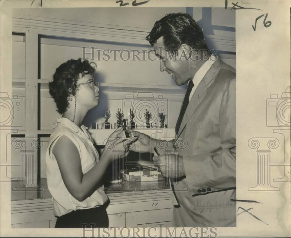 1956 Press Photo Susan Buillard receives trophy for most improved girl swimmer