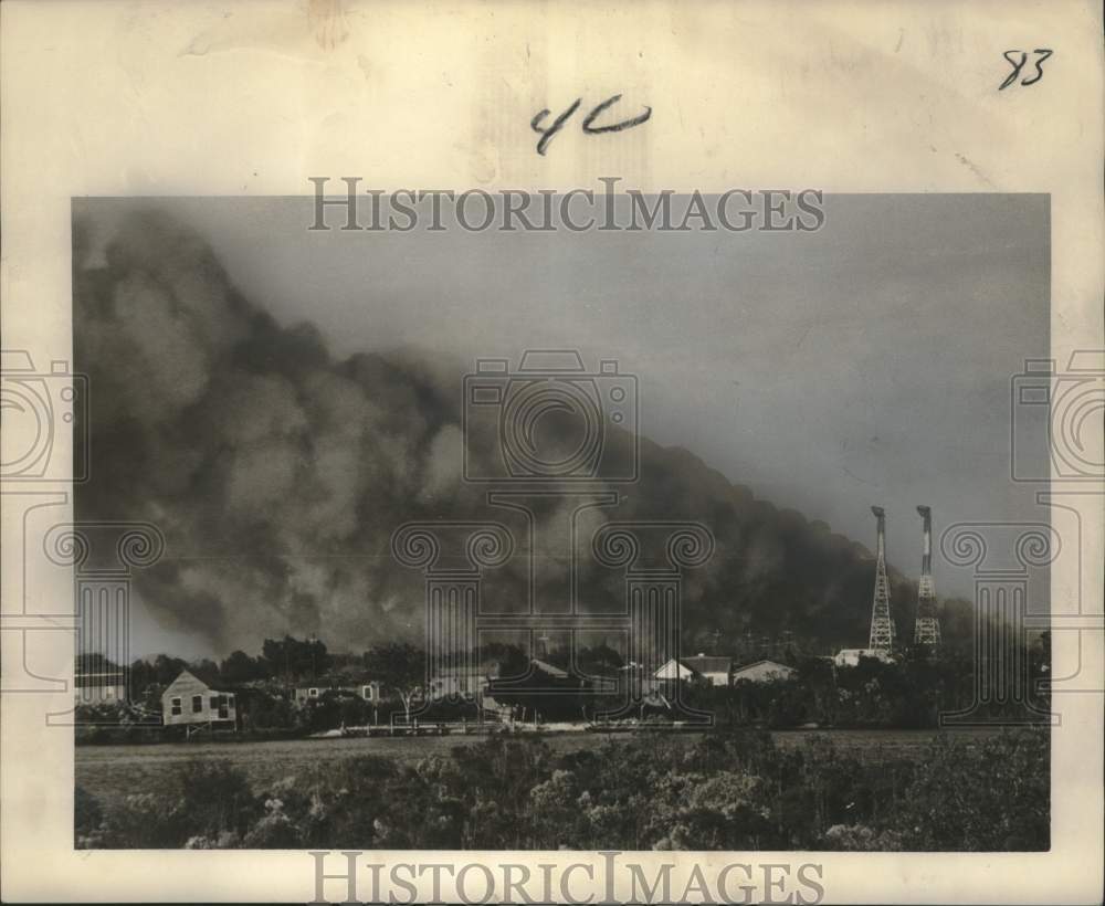 1963 Press Photo Burning grass in the marshes on Highway 90 near Chef Menteur