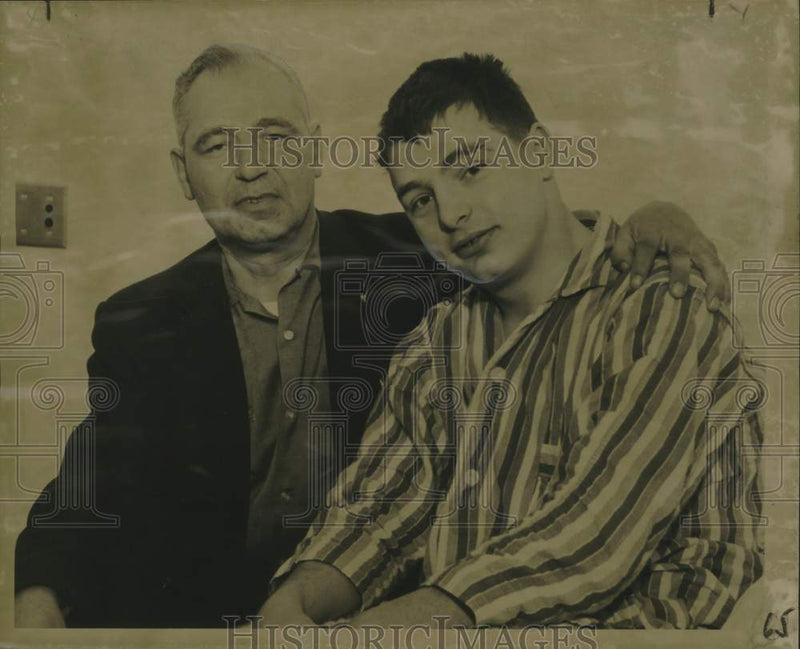 Load image into Gallery viewer, 1962 Press Photo College Football Player Frank Humniski and Father Reunited

