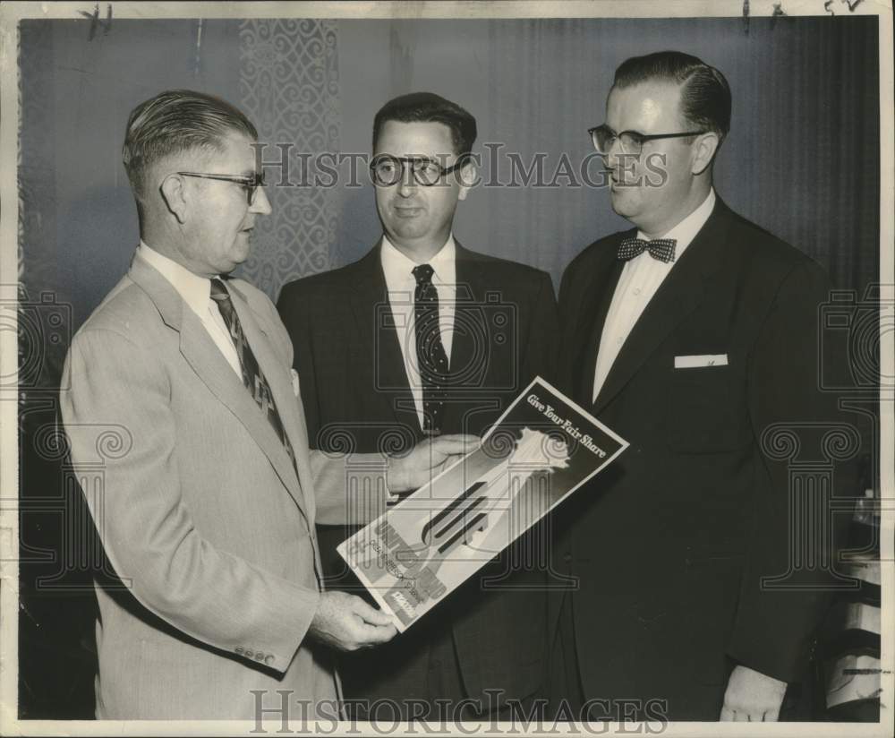 1955 Press Photo Members of Speakers&#39; Bureau Review United Fund Campaign Poster