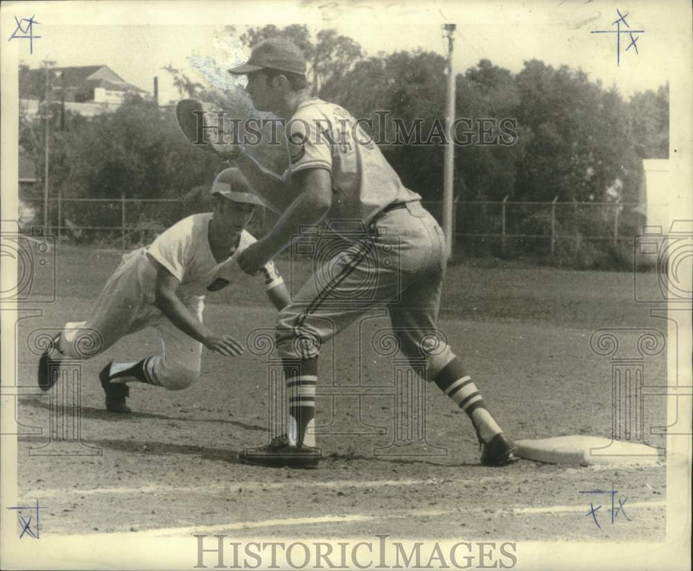 1969 Press Photo Floyd Hyer of TAC Amusement dives to base of Charles Stevedore
