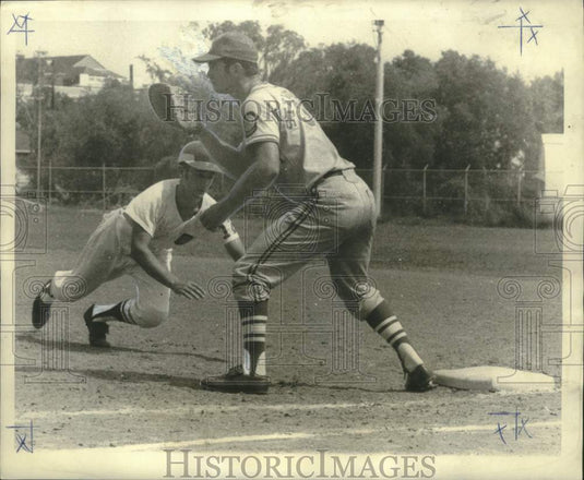 1969 Press Photo Floyd Hyer of TAC Amusement dives to base of Charles Stevedore