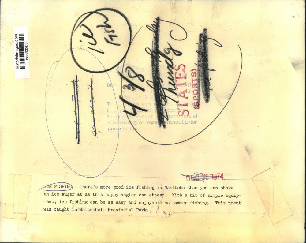 1974 Press Photo Ice fisherman in Manitoba catches a trout - noo33203