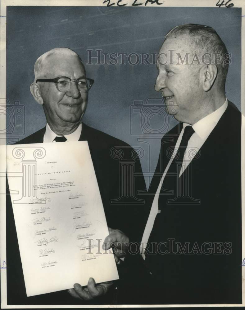 Load image into Gallery viewer, 1965 Press Photo Bill Keefe honored by Harry Martinez- New Orleans States-Item
