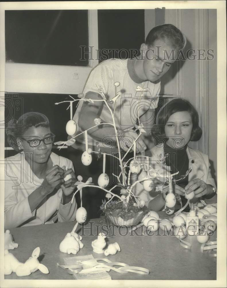 1968 Press Photo Youths Prepare Ceramic Egg Tree for Fair - noo33664