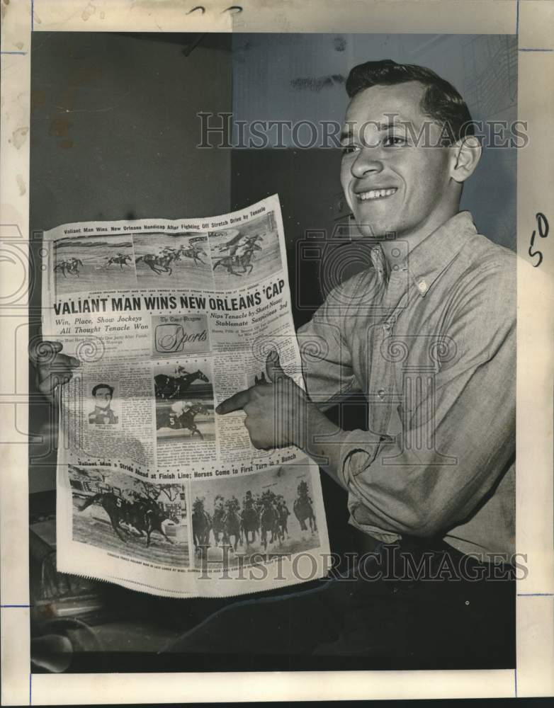 1965 Press Photo Billy Mayorga with paper showing Valiant Man horse race winner- Historic Images