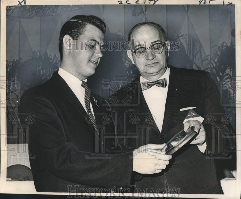Load image into Gallery viewer, 1964 Press Photo J.C. Lynn, New Orleans Distributive Education Club plaque
