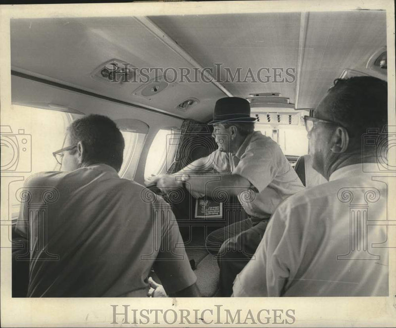 Load image into Gallery viewer, 1969 Press Photo Governor John J. McKeithen view damage in the Empire Buras area
