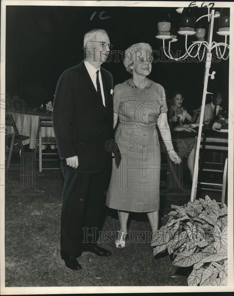 Load image into Gallery viewer, 1961 Press Photo Mr. &amp; Mrs. Stuart L. Landry attending a party in Garden lane
