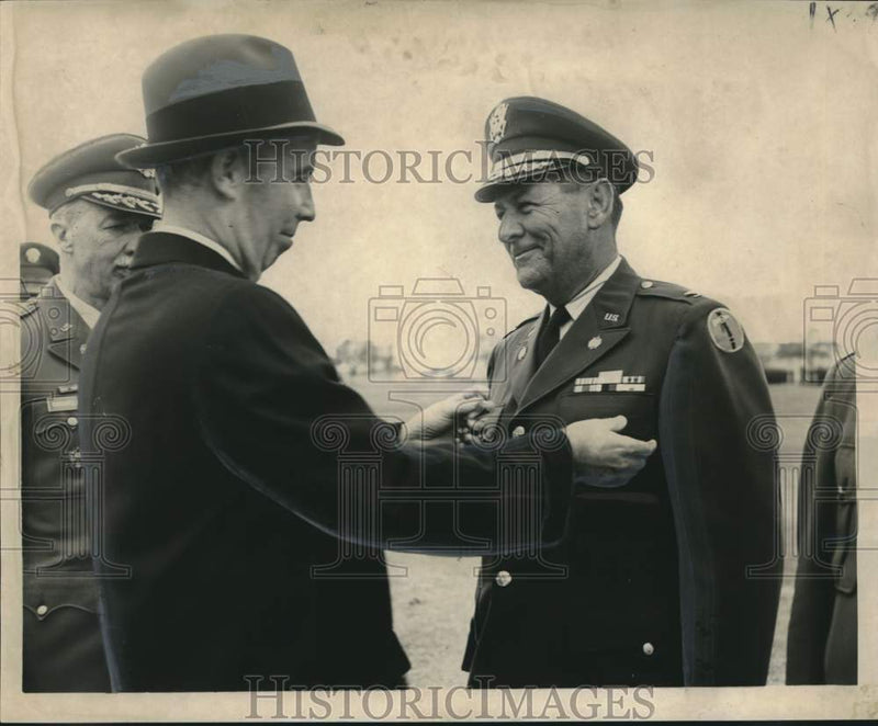 Load image into Gallery viewer, 1968 Press Photo Legion of Merit Given to Col Peter Miller Jr by Norman S. Paul
