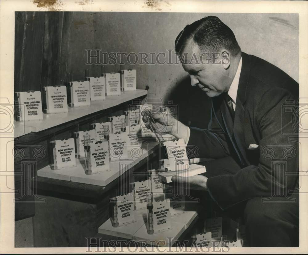 1965 Press Photo Anti-mosquito campaign examined by George Carmichael- Historic Images