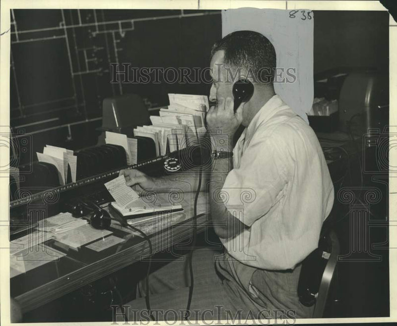 Load image into Gallery viewer, 1954 Press Photo Dispatcher William Felker relays work order over the radio
