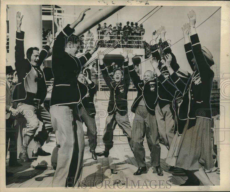 Load image into Gallery viewer, 1948 Press Photo New Zealand Olympic dance team does a Maori war dance
