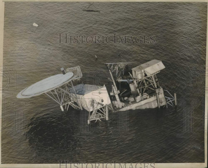 Load image into Gallery viewer, 1957 Press Photo Aerial view of the capsized Deepwater No. 2 Rig, Gulf of Mexico
