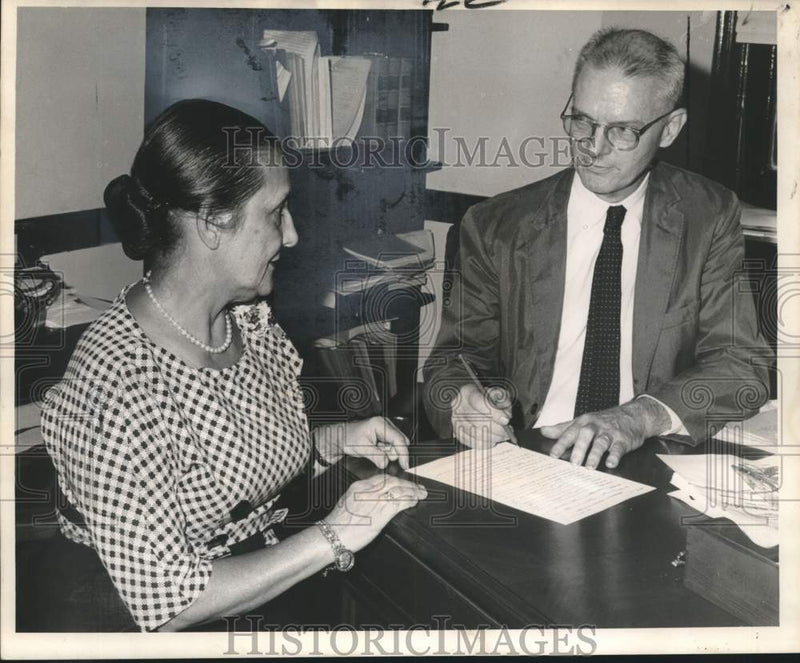 Load image into Gallery viewer, 1962 Press Photo Clerk &amp; Deputy Clerk review Jury Duty form in New Orleans
