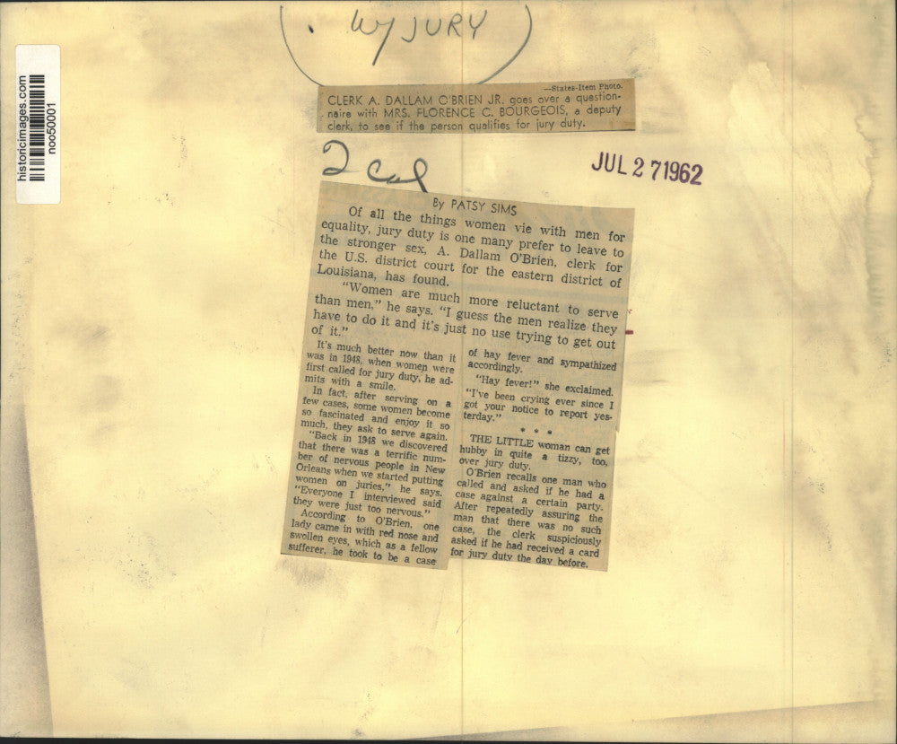 1962 Press Photo Clerk & Deputy Clerk review Jury Duty form in New Orleans