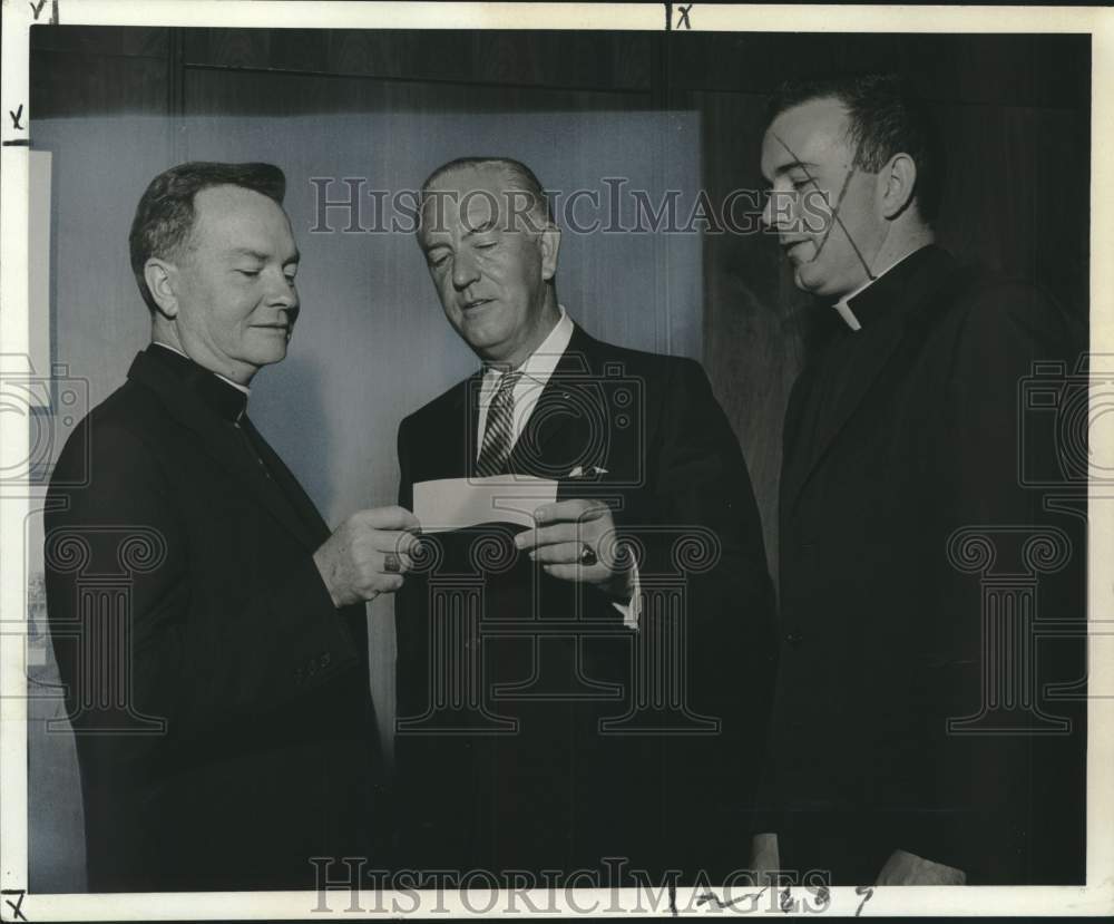 1966 Press Photo Archbishop Phillip M. Hannan Receives Check from T.C. Nugent
