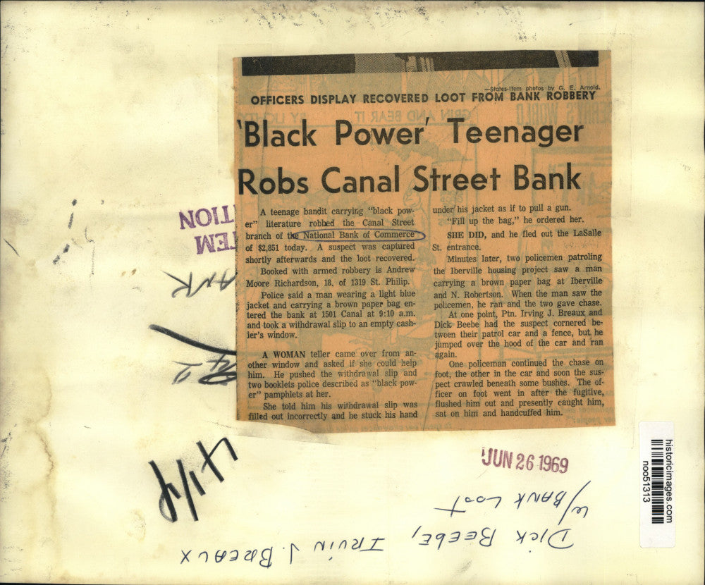 1969 Press Photo Officers display recovered loot from National Bank of Commerce