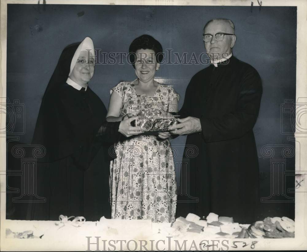 1959 Press Photo Our Lady of Prompt Succor school receiving donations