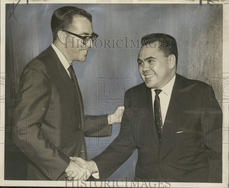 Load image into Gallery viewer, 1967 Press Photo Lawler Sandoz Peyroux congratulated by Lawrence Higgins Jr.
