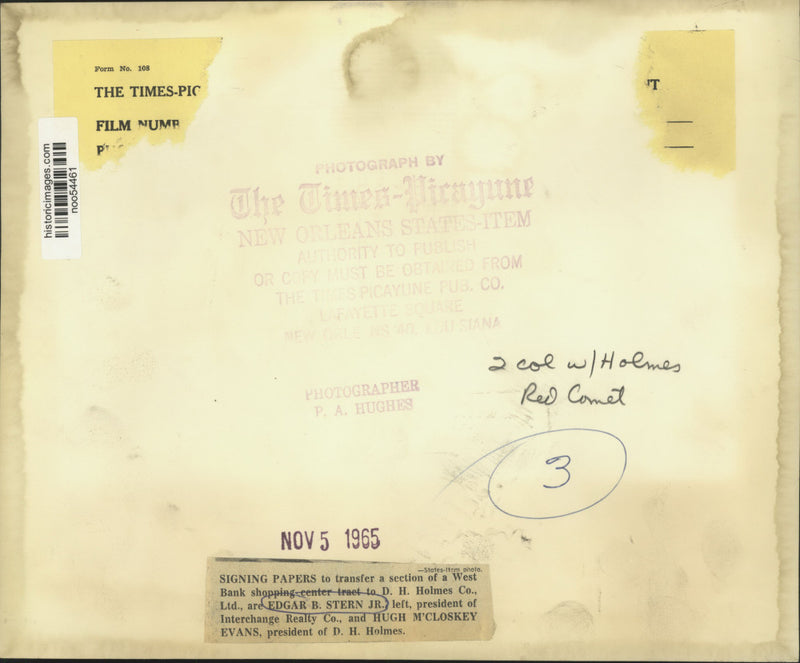 Load image into Gallery viewer, 1965 Press Photo Edgar B. Stern Jr. signs agreement with Hugh McCloskey Evans
