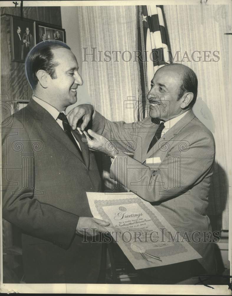 Load image into Gallery viewer, 1969 Press Photo Colombian Ambassador Misael Pastrana receives pin from Schiro.
