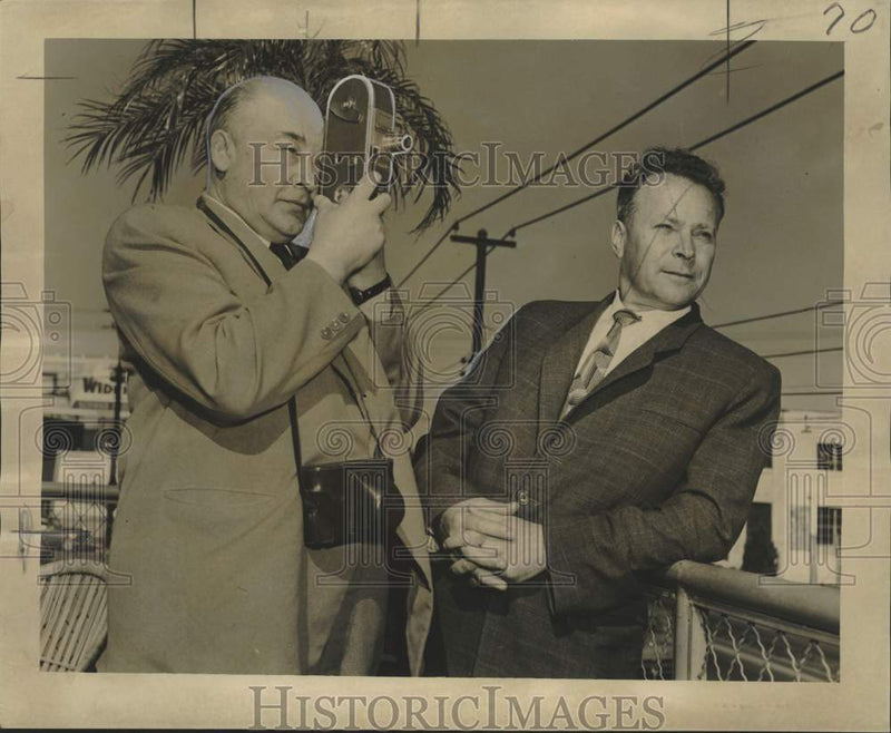 Load image into Gallery viewer, 1955 Press Photo A.V. Vlasov and N.P. Lysenko take movies of Tulane Avenue
