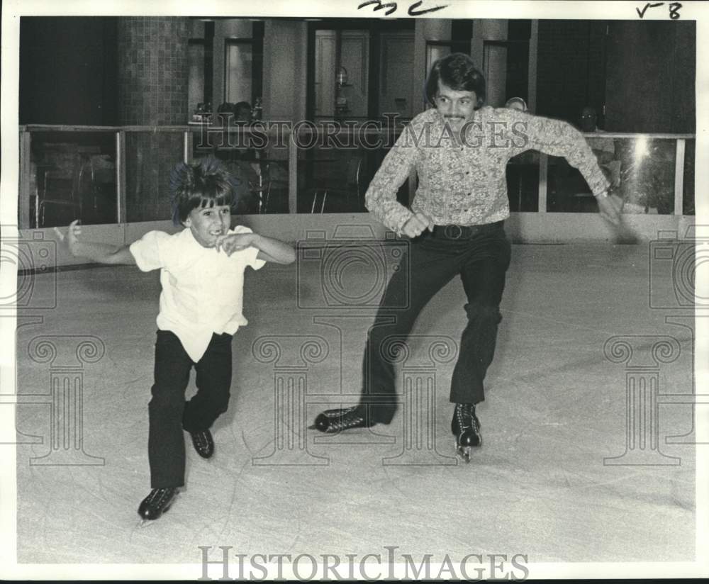 1975 Press Photo Victor Messa IV skates with father Victor Messa III - noo59950- Historic Images