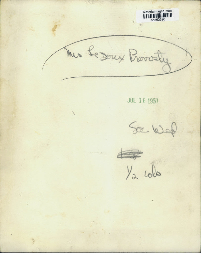 1957 Press Photo Mrs. LeDorex Prevosty appears at event with unidentified man.