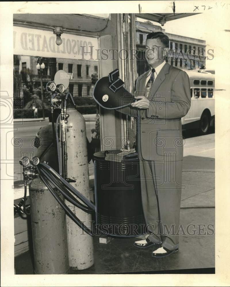 Load image into Gallery viewer, 1953 Press Photo Consolidated Welding's C.A. (Dick) Young with welding helmet
