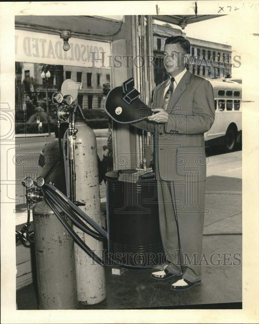 1953 Press Photo Consolidated Welding's C.A. (Dick) Young with welding helmet