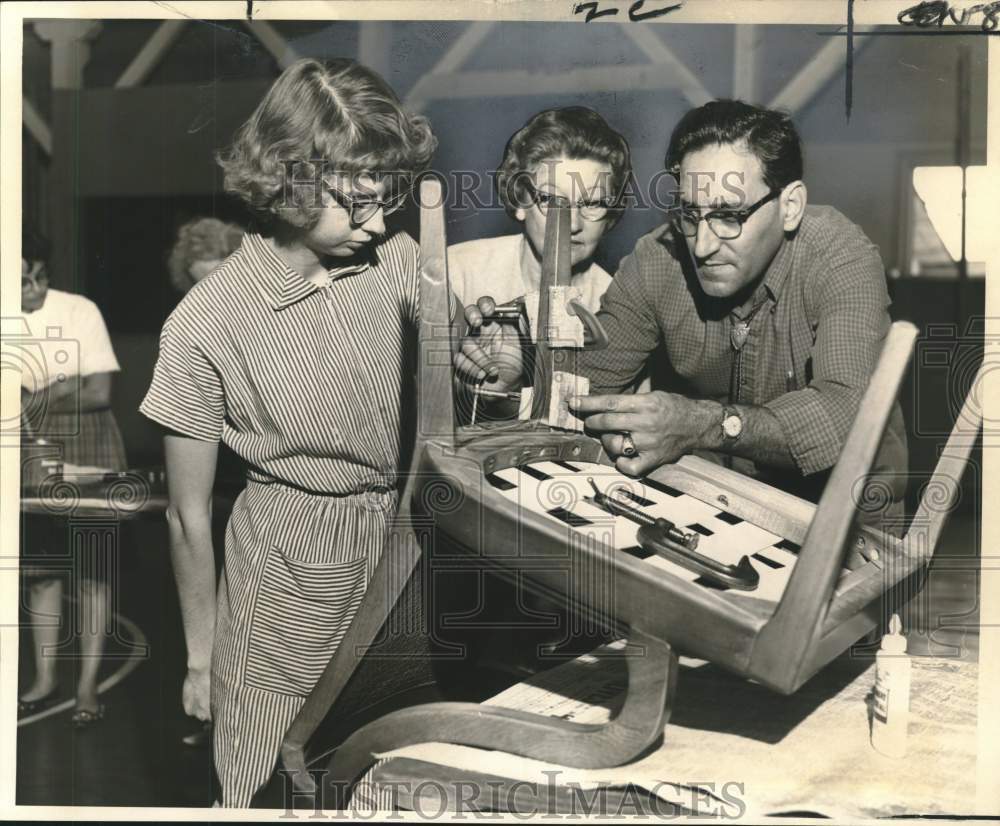 1965 Press Photo Furniture repair and refinish demonstration by Luke Provenzano