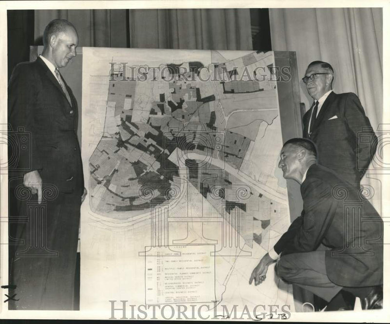 Load image into Gallery viewer, 1967 Press Photo New Orleans Commission members study map of Algiers Lower Coast
