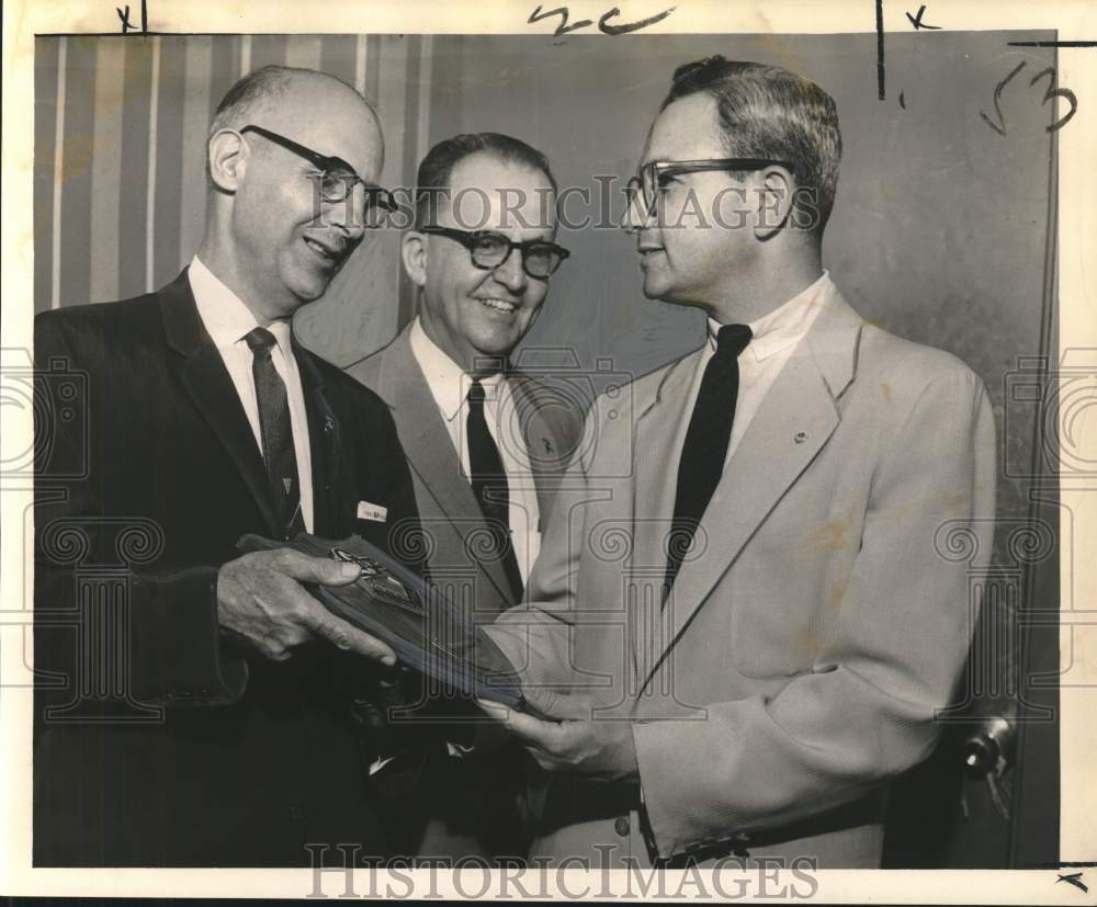 1962 Press Photo Club officials give &quot;Outstanding Sertoman&quot; award to G.P. Serpas