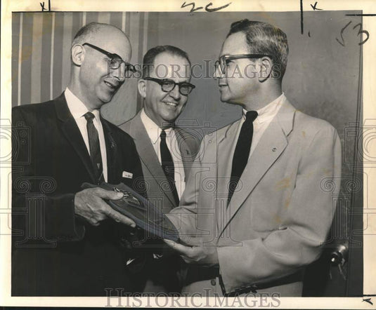 1962 Press Photo Club officials give "Outstanding Sertoman" award to G.P. Serpas