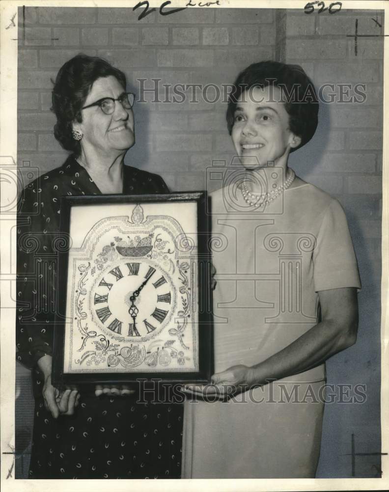 1965 Press Photo Mmes. Lewis Wright and Ethel Liberto display embroidered clock
