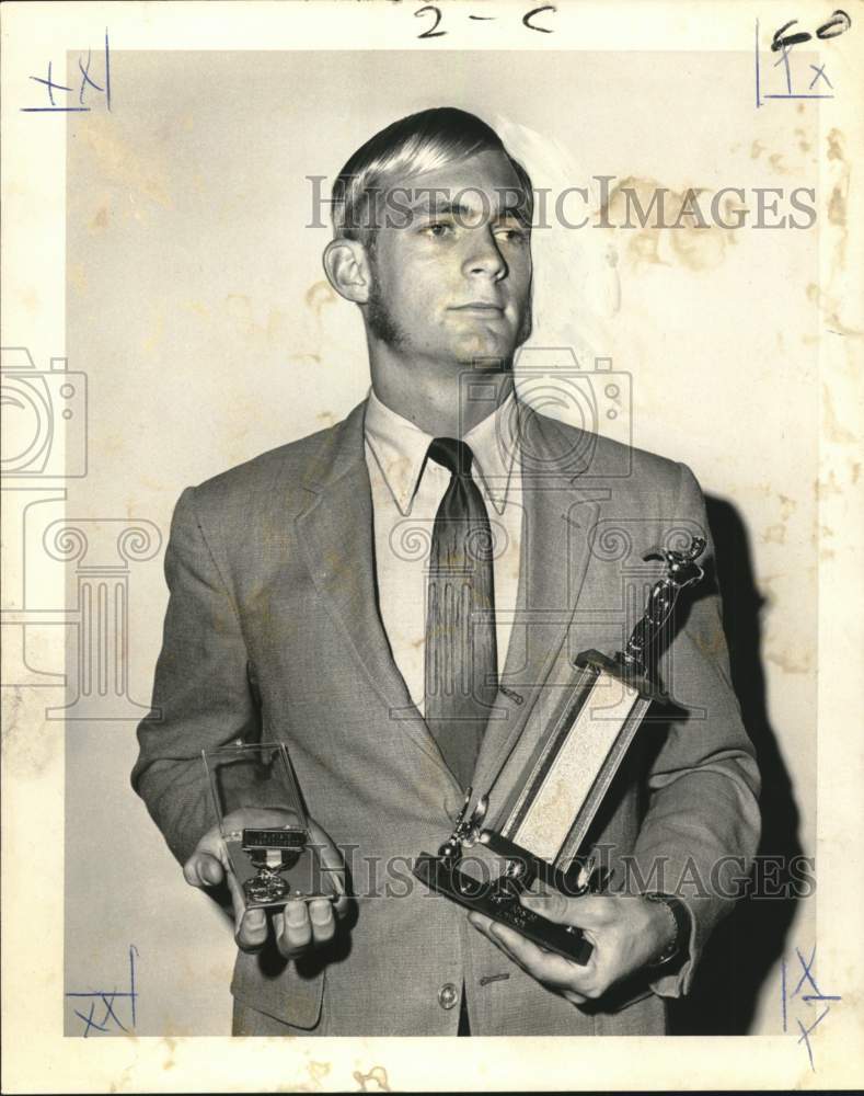 1969 Press Photo John T. Wilson holding his trophy and medal - noo65202- Historic Images