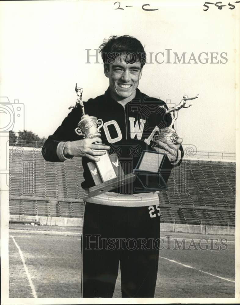 1968 Press Photo Runner Larry Wieczorek of Iowa holds his trophies - noo65360- Historic Images