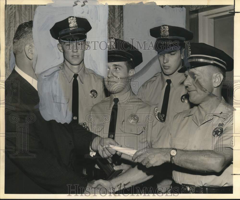 1961 Press Photo Frank Wilson and other Cadet Class members congratulated
