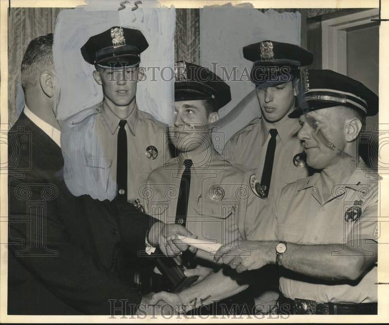 Load image into Gallery viewer, 1961 Press Photo Frank Wilson and other Cadet Class members congratulated
