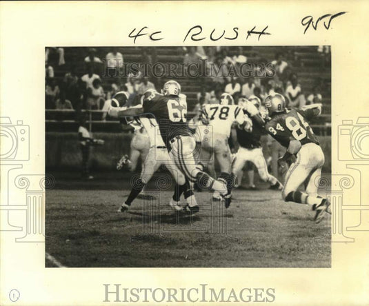1975 Press Photo McDonogh's Aaron Williams obliterated by St. Aug's Gilroy,