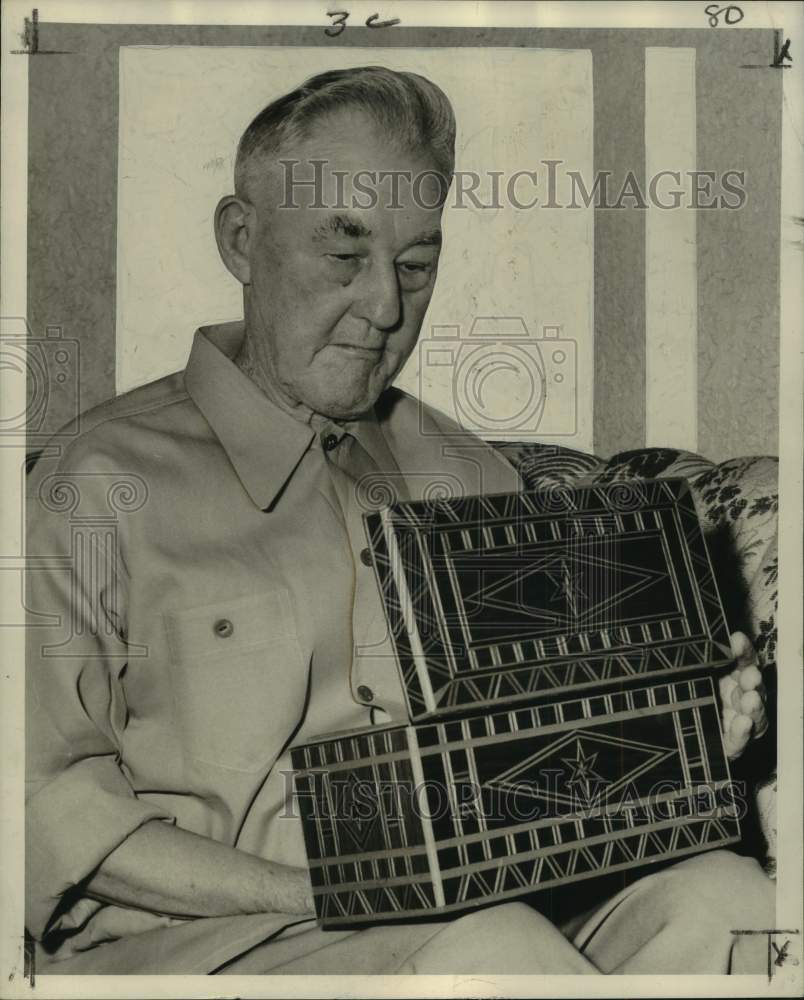 1950 Press Photo Anthony Varenholt with Family Heirloom, Louisiana - noo67697