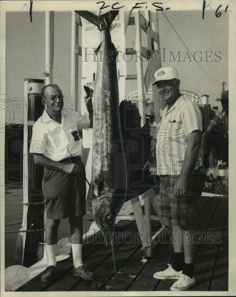Load image into Gallery viewer, 1969 Press Photo E. L. Van Every with Sailfish in Empire-South Pass Tarpon Rodeo

