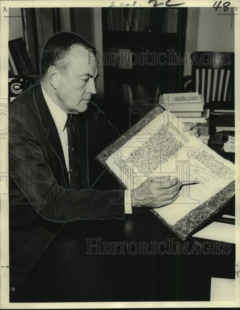 Load image into Gallery viewer, 1962 Press Photo Professor Robert Wauchope examines ancient manuscript volume
