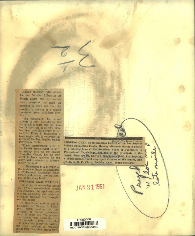 1961 Press Photo Officials of American Board of Examiners examine a booklet