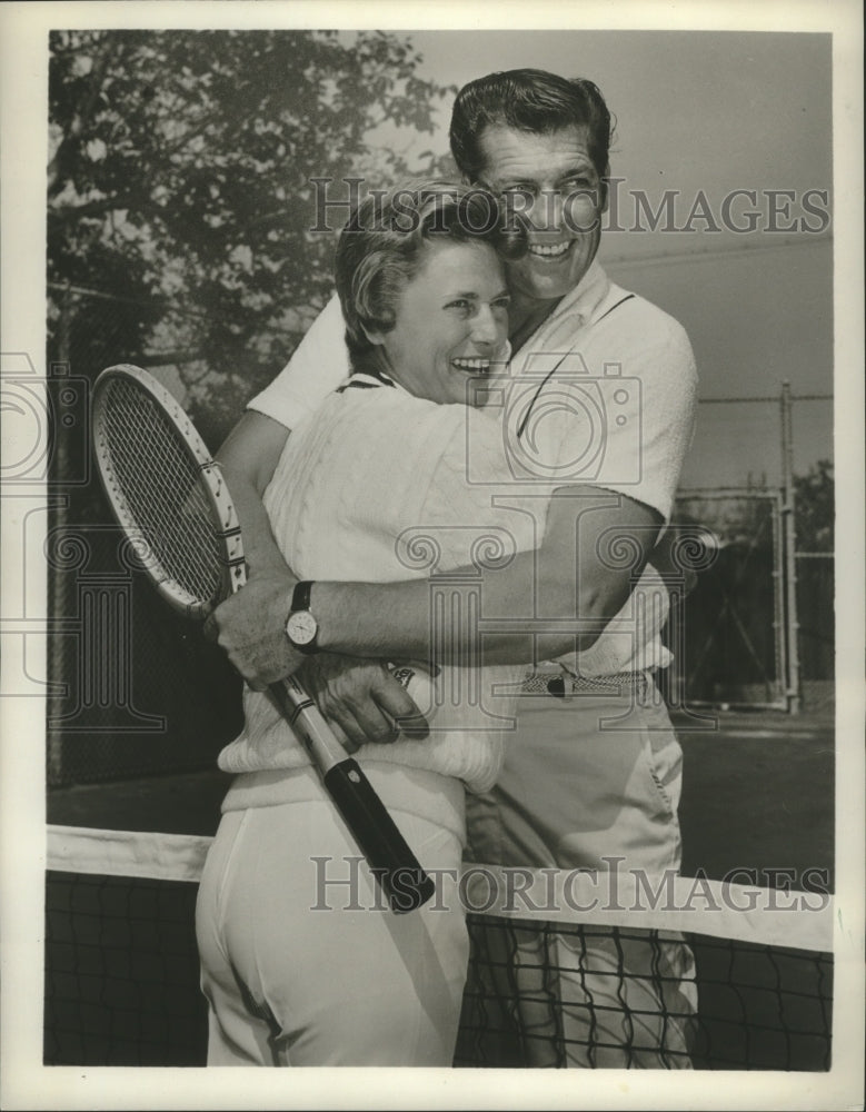 Load image into Gallery viewer, 1957 Press Photo Jim L. Brown and his wife Betty on the Tennis courts
