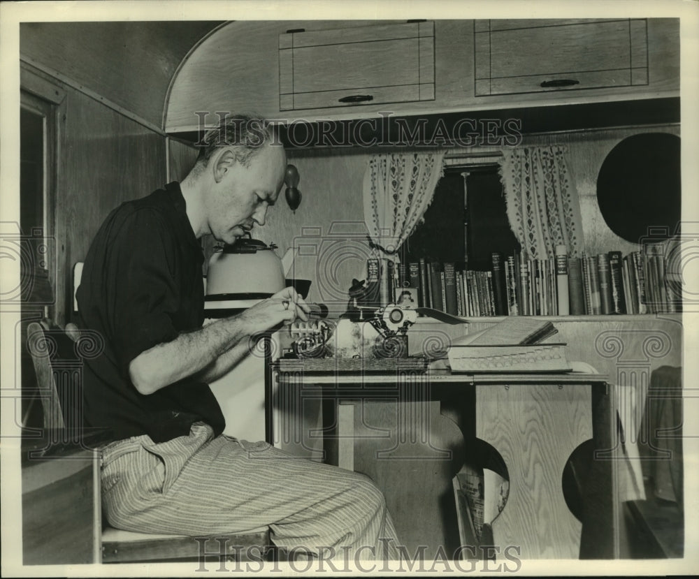 1947 Press Photo Author Thomas Duncan working on manuscript - nop22874