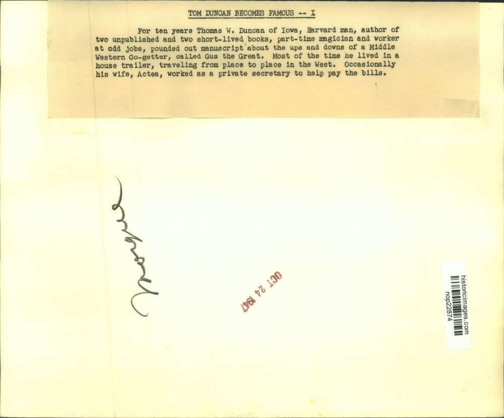 1947 Press Photo Author Thomas Duncan working on manuscript - nop22874