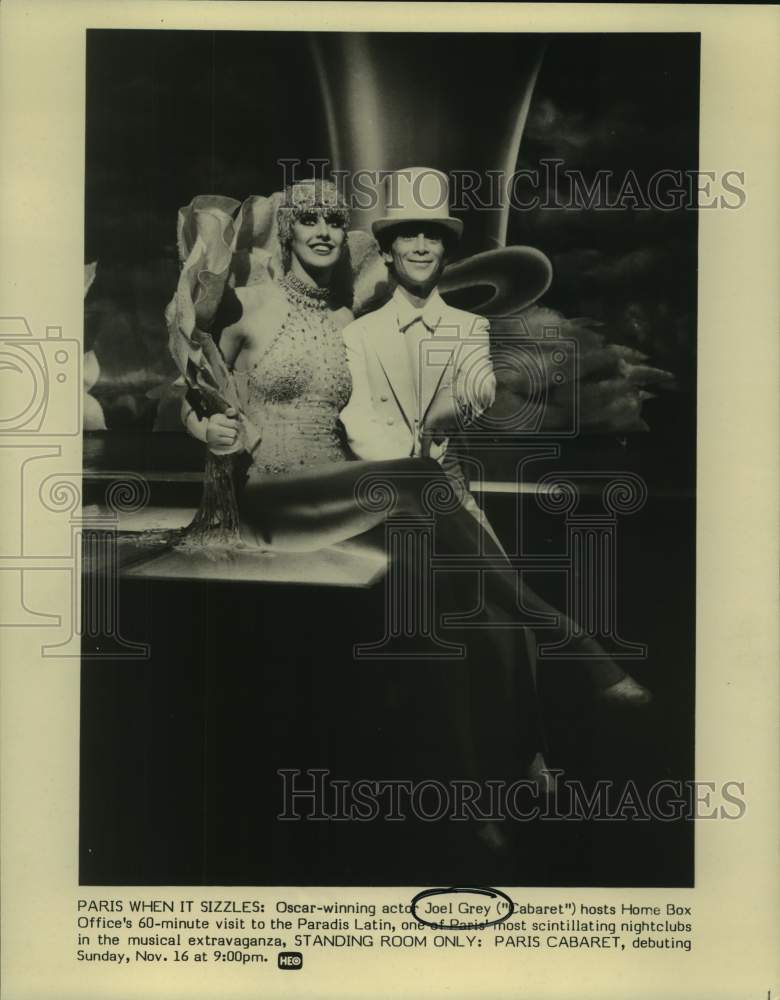 Load image into Gallery viewer, 1980 Press Photo Oscar-winning actor Joel Grey with Herma Vos in "Paris Cabaret"
